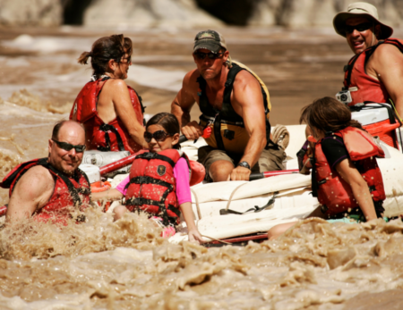 raft running Colorado River rapids