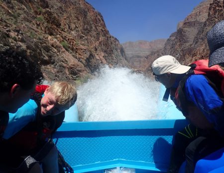 motor raft running big whitewater on One day Grand Canyon trip