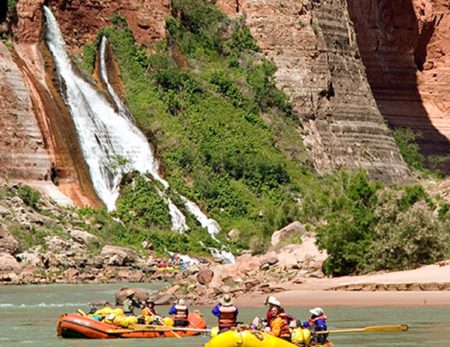 rafts on Colorado River with Vaseys Paradise in the background