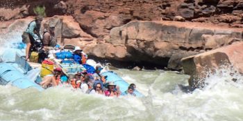 Motor Raft running House Rock Rapid on the Colorado River