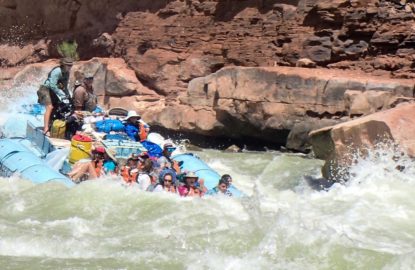 Motor Raft running House Rock Rapid on the Colorado River