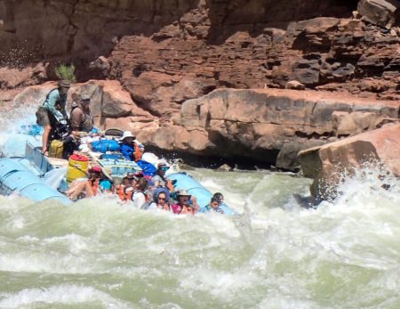 Motor Raft running House Rock Rapid on the Colorado River