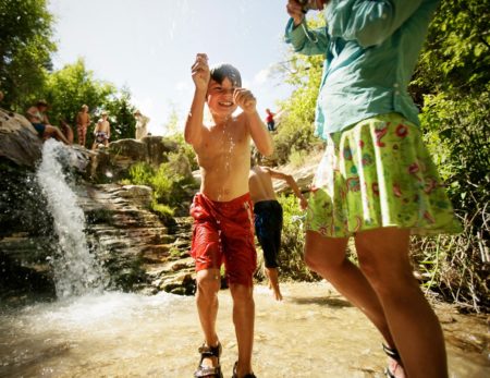 kids playing in jones-hole-creek-green-river-gates-of-lodore-canyon rafting