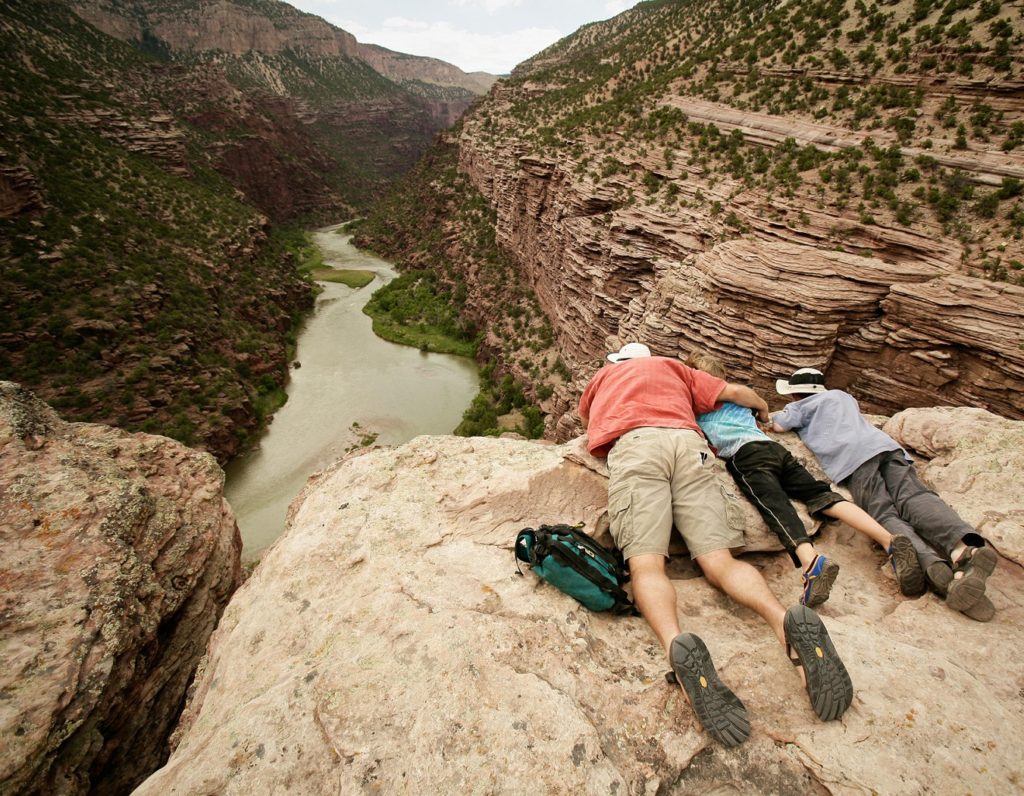 rafter family looking down on lodore canyon of the green river