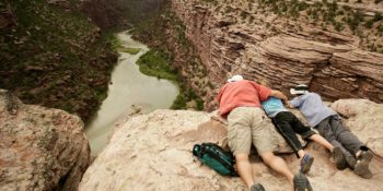 rafter family looking down on lodore canyon of the green river