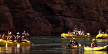rafts floating in calm water on the Colorado River