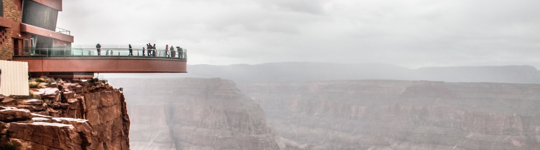 Grand Canyon Skywalk with clouds and canyon in the background