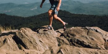 men walking on rocks in Grand Canyon rafting sandals