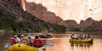 rafters floating in the shade with walls of Grand Canyon all around