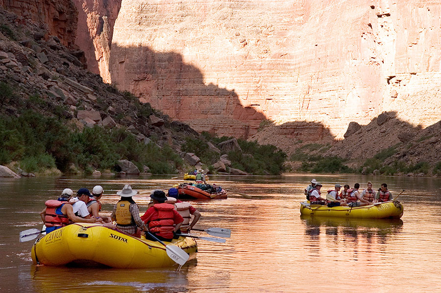 rafters floating in the shade with walls of Grand Canyon all around