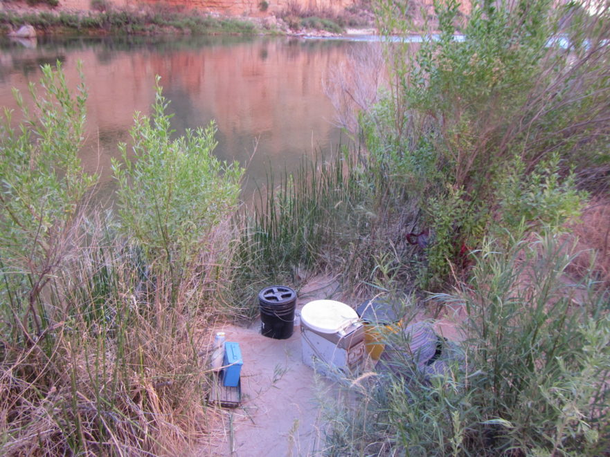 whitewater rafting toilet with Colorado River in the background