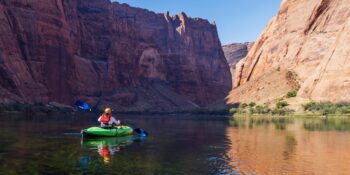 kayaker in horseshoe bend colorado river