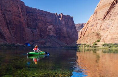 kayaker in horseshoe bend colorado river