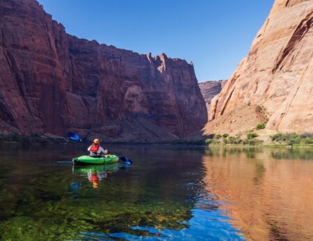 kayaker in horseshoe bend colorado river