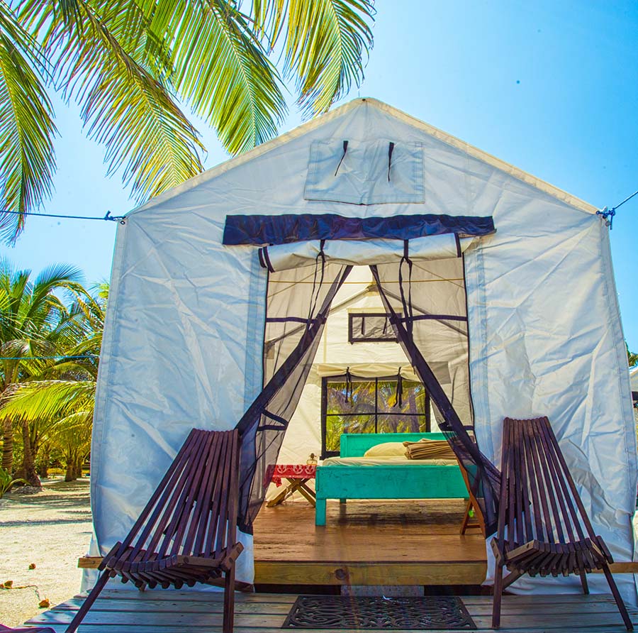 tent cabin on white sand Glovers Reef beach