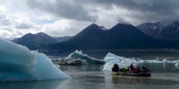 raft surrounded by glacier in Alaska