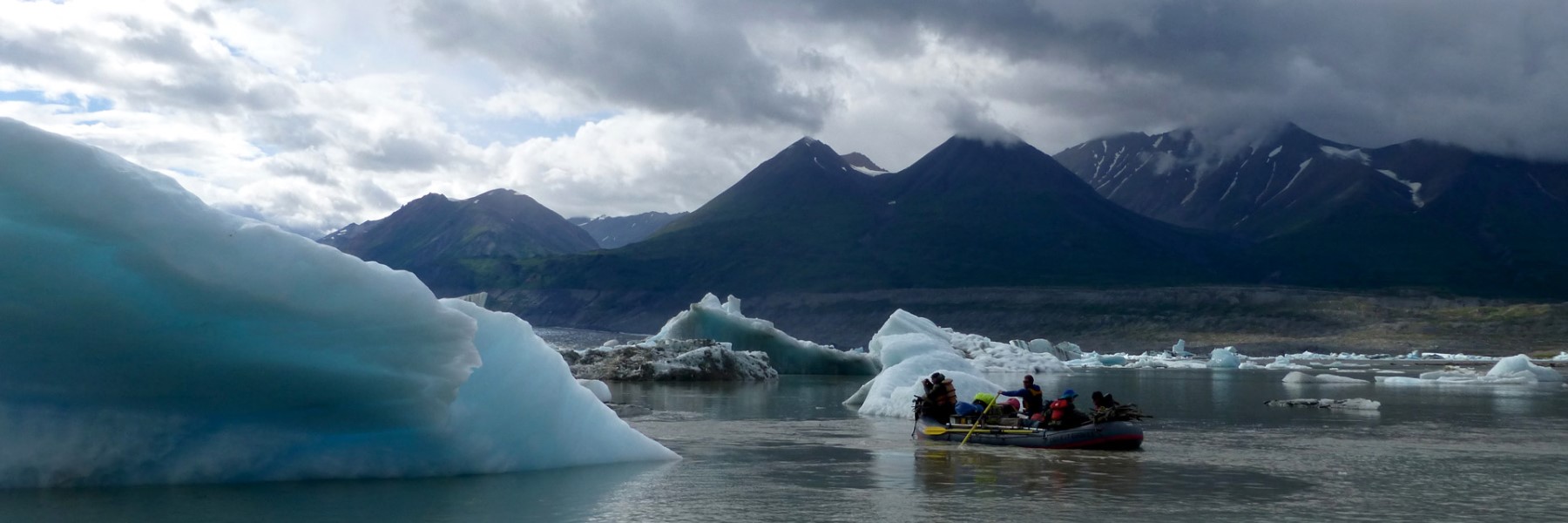 raft surrounded by glacier in Alaska