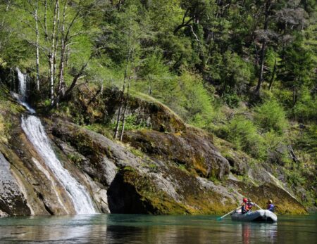 raft in remote wilderness next to waterfall