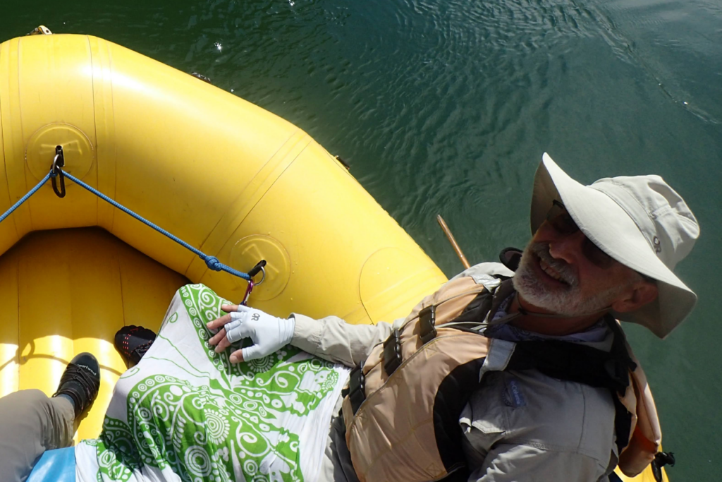 rafter wear sun gloves, sunglasses and sun hat