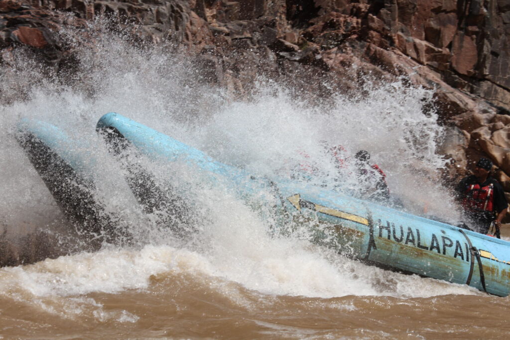 motorized raft running rapid in Grand Canyon West
