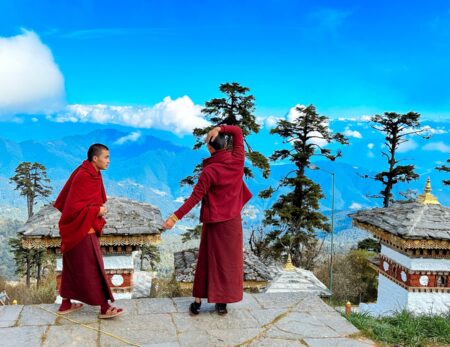 Bhutanese looking at mountains